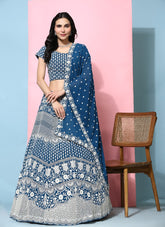 Pretty looking wedding wear lehenga choli in blue colour